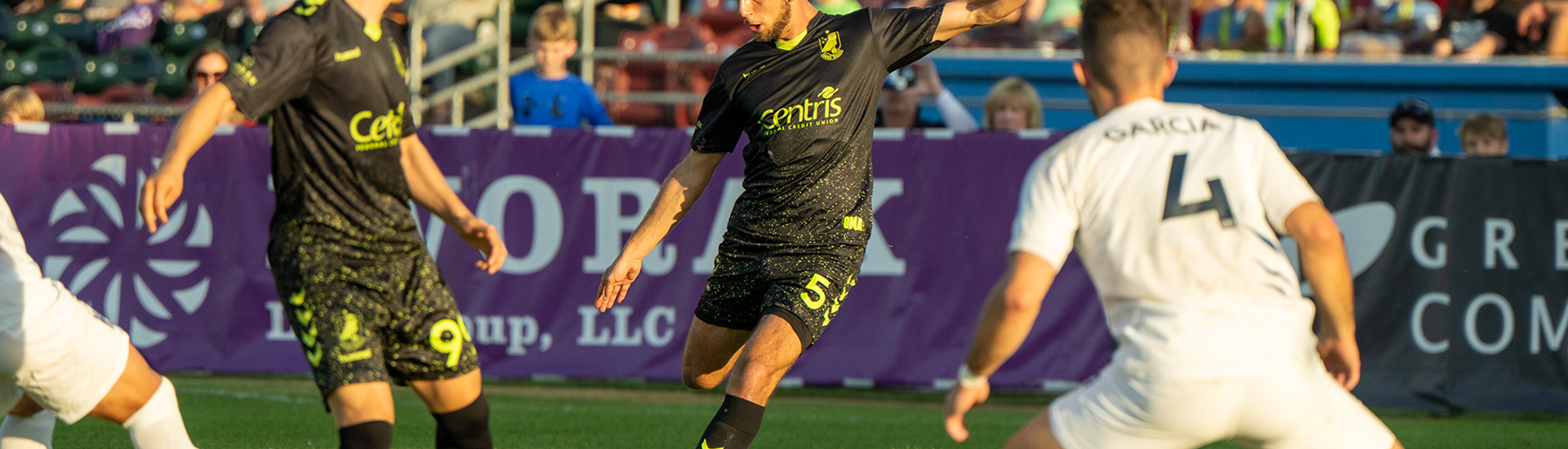 Marco Milanese striking the ball against Hailstorm