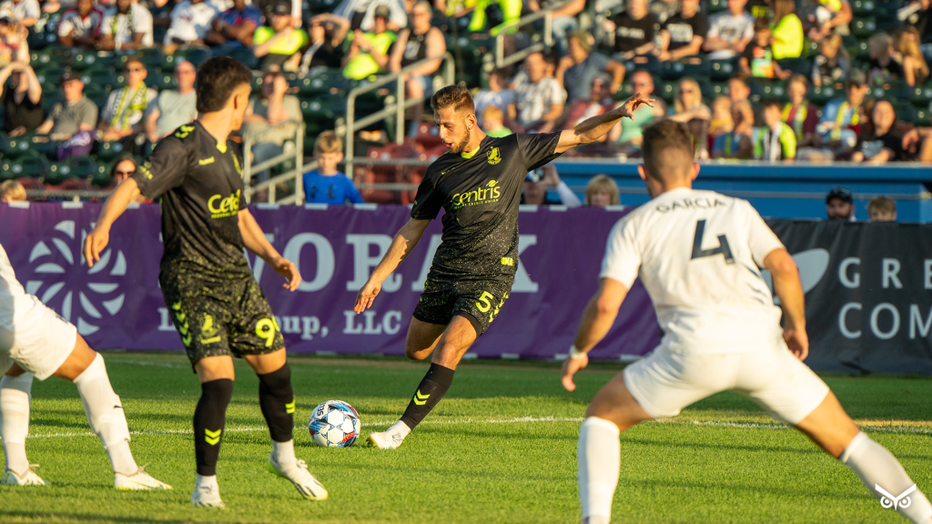 Marco Milanese striking the ball against Hailstorm