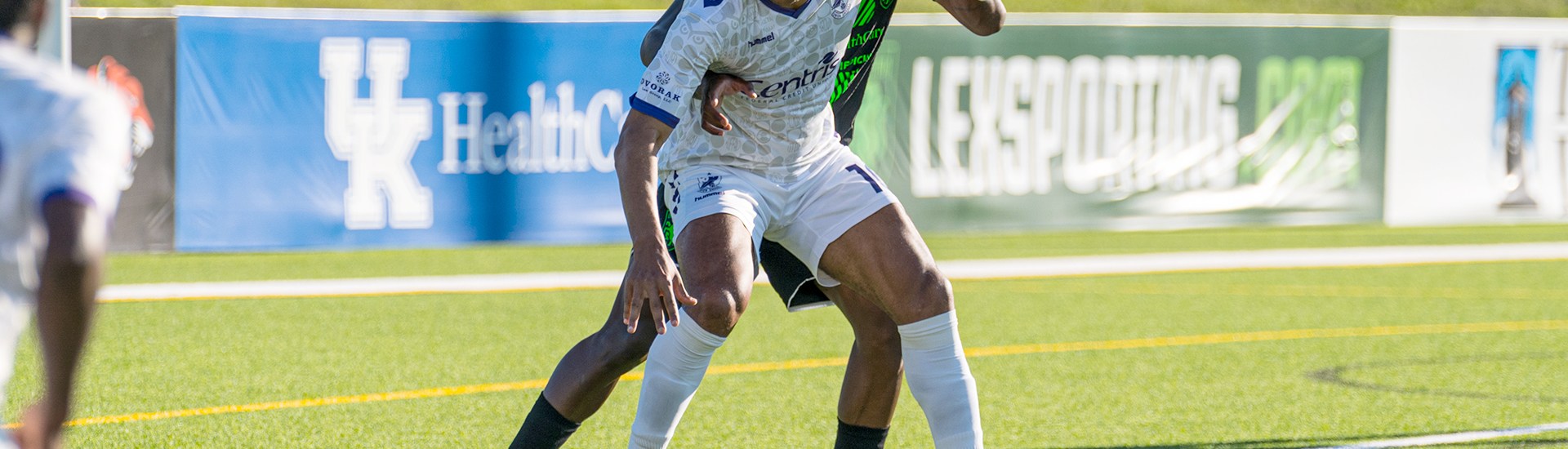 Steevan Dos Santos holding off a Lexington SC defender