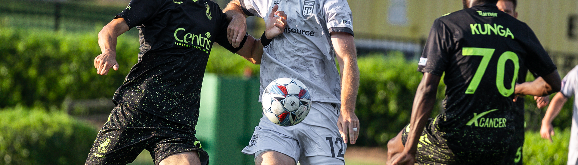 Union Omaha players fighting for the ball against Greenville